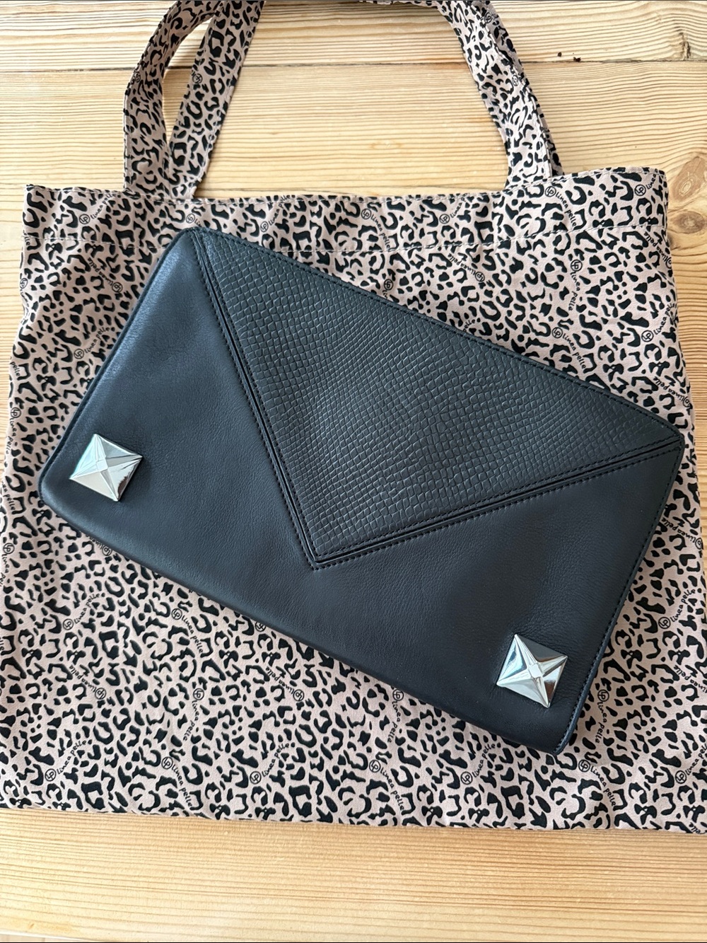 Linea Pelle black clutch used 2 times silver hardware